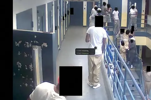 The board of correction provided images of deplorable conditions at Rikers Island to Gothamist last year in response to a public records request. This is a still shot of a video showing people in custody carrying an unresponsive individual to medical assistance.